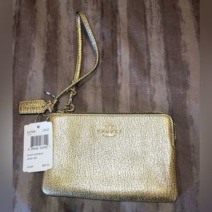Coach Wristlet New with tags in Gold